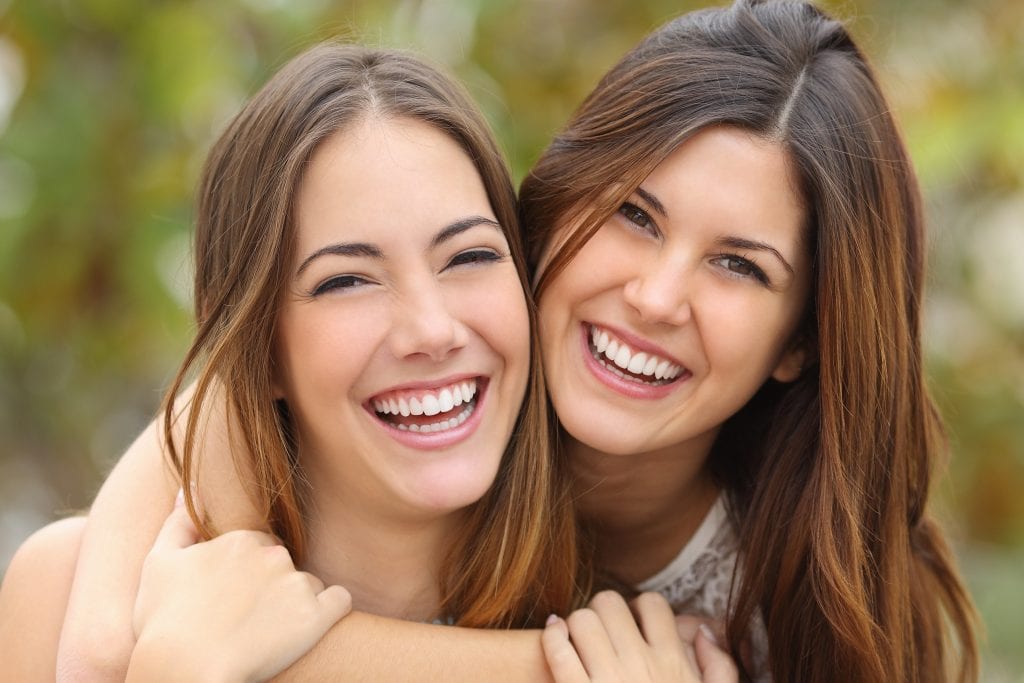 Women smiling with white teeth | Crane & Seager Orthodontics in Fort Collins and Loveland, CO